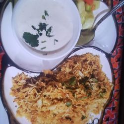 Bombay Palace - The chicken biryani with raita