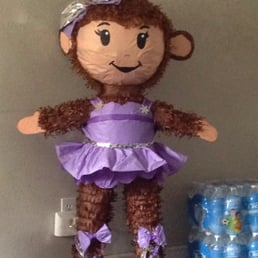 Here's the lavender monkey not what we discussed the fur should be lavender the tutu should be silver dark purple n white Here's the lavender monkey not what we discussed the fur should be lavender the tutu should be silver dark purple n white
