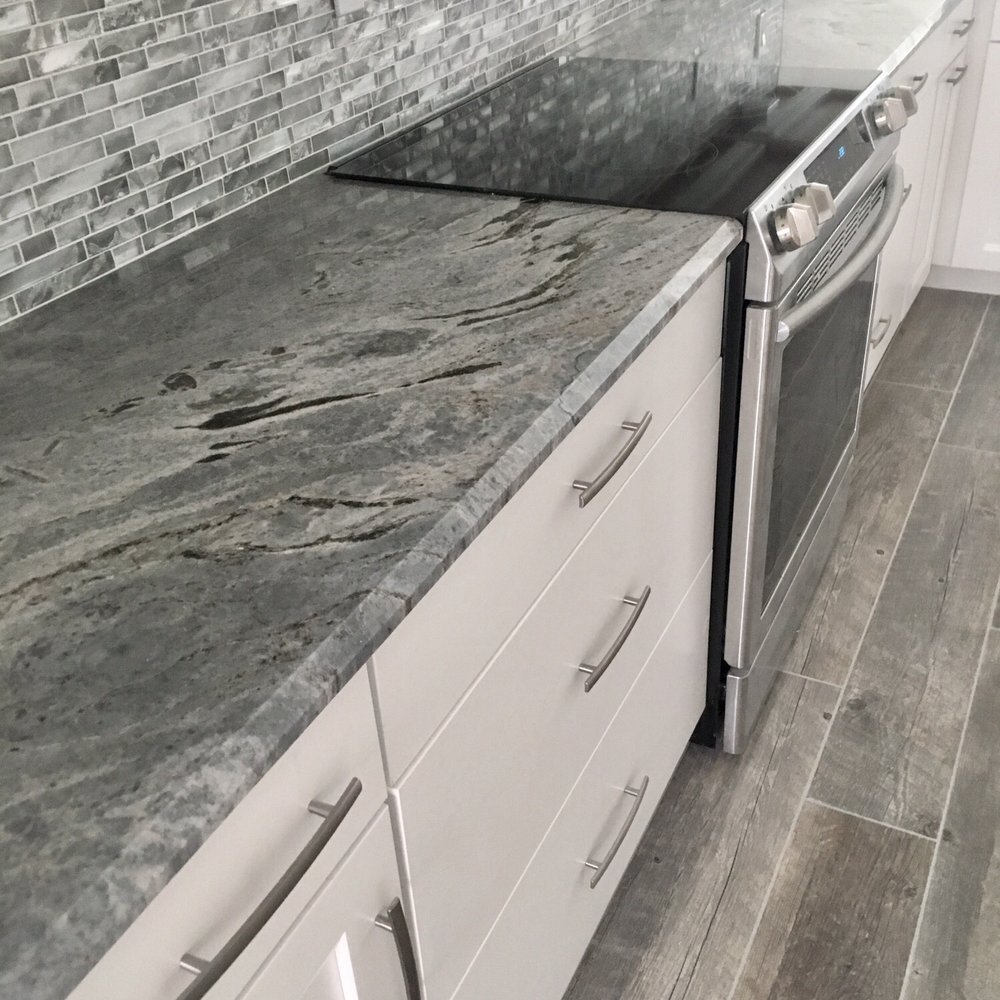 Set In Stone - My granite fit perfectly and brought the kitchen to life. - Building Supplies Near Me - Naples, Florida Set In Stone - My granite fit perfectly and brought the kitchen to life. - Building Supplies Near Me - Naples, Florida