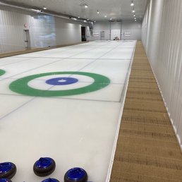 First time I've ever been in a restaurant that has a curling arena.  They have a league and also train people how to play.