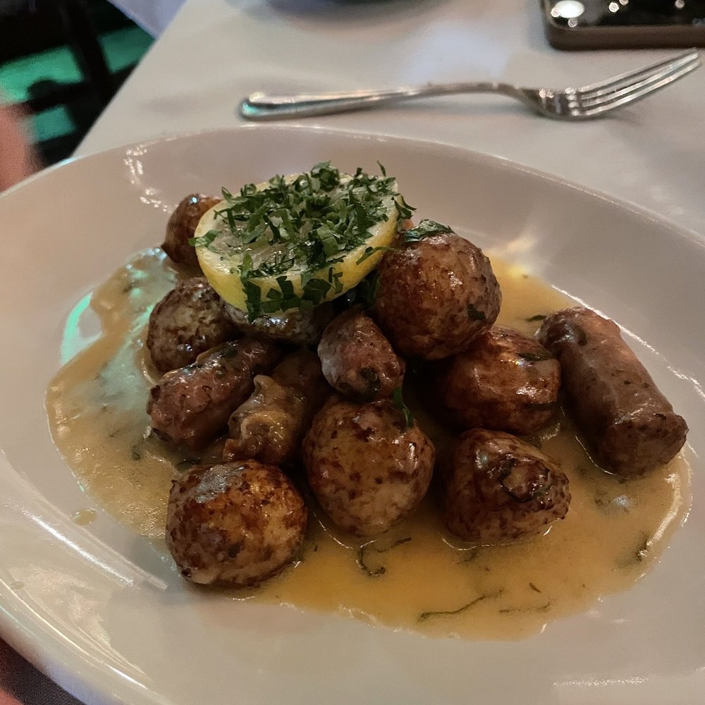Chicken meatballs, sausage all in a white wine lens butter sauce Chicken meatballs, sausage all in a white wine lens butter sauce