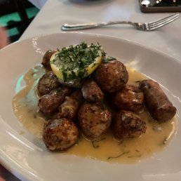 Chicken meatballs, sausage all in a white wine lens butter sauce