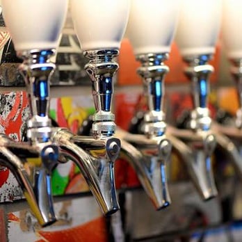 Tin Man - Reused and recycled tap wall of skateboard decks and European glazed ceramic tap handles. - Beer Bar Near Me - El Paso, Texas Tin Man - Reused and recycled tap wall of skateboard decks and European glazed ceramic tap handles. - Beer Bar Near Me - El Paso, Texas