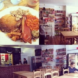 cooked breakfast- bacon, pancakes and syrup, beans, cashew cheese stuffed mushroom, tofu scramble, sausage, garlic herb potato