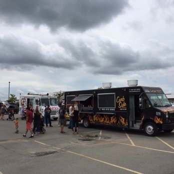 Curbside Foods - food trucks parked in a parking lot - Food Trucks Near Me - Burlington, Ontario Curbside Foods - food trucks parked in a parking lot - Food Trucks Near Me - Burlington, Ontario