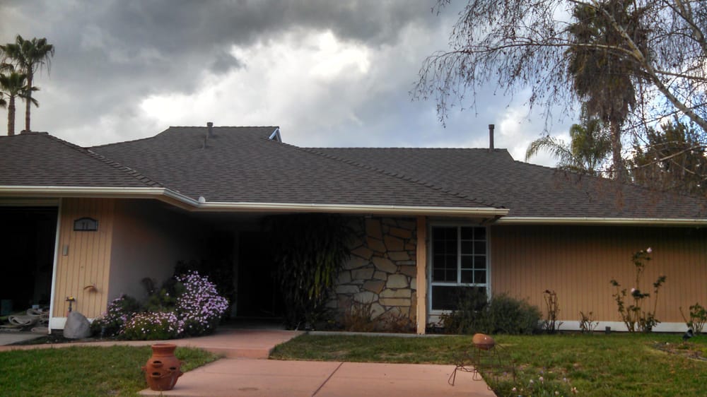 Slide of Wolfe Roofing Company