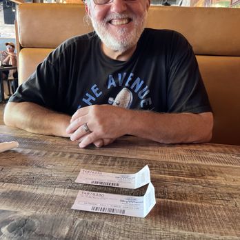 Kelsey's - My man after the ride on the sky wheel! Ate at Kelsey's and enjoyed! Thanks Eric!!! - American Near Me - Niagara Falls, Ontario