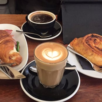 Kaffeine - Breakfast: Latte, black Americano, croissant with Ham & a must try red pesto mozzarella pastry roll - Coffee & Tea Near Me - London, XGL Kaffeine - Breakfast: Latte, black Americano, croissant with Ham & a must try red pesto mozzarella pastry roll - Coffee & Tea Near Me - London, XGL