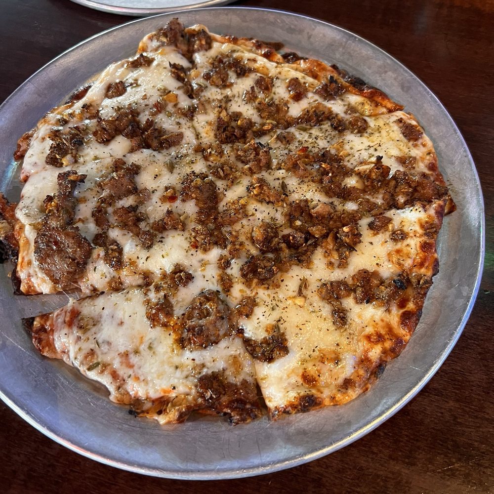 Cheese pizza with Italian sausage added Cheese pizza with Italian sausage added