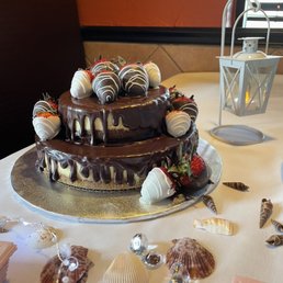 Two tiered chocolate covered strawberry dressed cheesecake!!! Two tiered chocolate covered strawberry dressed cheesecake!!!