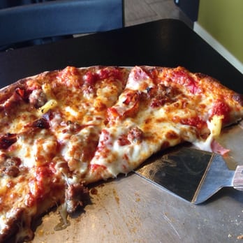 Licari's Sicilian Pizza Kitchen - Pizza is overpriced in my opinion. The small restraunt is nicely designed and located but the food as you can see is average - Italian Near Me - Grand Rapids, Michigan Licari's Sicilian Pizza Kitchen - Pizza is overpriced in my opinion. The small restraunt is nicely designed and located but the food as you can see is average - Italian Near Me - Grand Rapids, Michigan