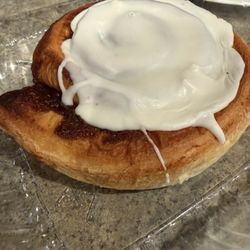 Bagel Run - Huge soft cinnamon roll . Enough to feed two people .