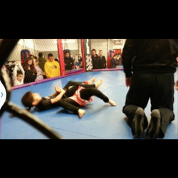 Fighting Arts Academy - Isabella competing in a grappling competition at FAA