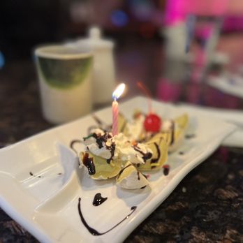 Blue Ginger Asian Bistro - a banana split with a candle - Japanese Near Me - Parma, Ohio Blue Ginger Asian Bistro - a banana split with a candle - Japanese Near Me - Parma, Ohio