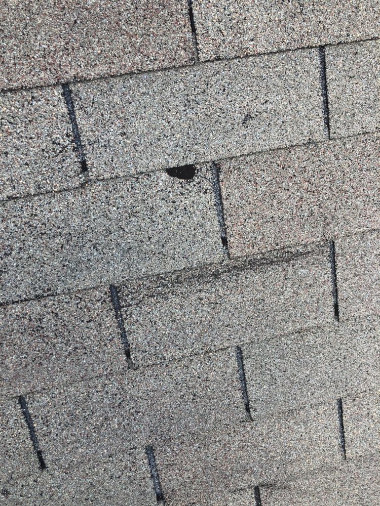 Slide of MTZ Roofing