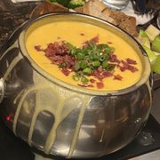 Photo of The Melting Pot - Oklahoma City, OK, United States. Loaded Backed Potato Cheddar