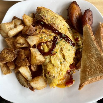 Huskey’s Kitchen - Jam rock (jerk chicken) Omelette with crispy potatoes and plantains.....so good! - Breakfast & Brunch Near Me - Decatur, Georgia Huskey’s Kitchen - Jam rock (jerk chicken) Omelette with crispy potatoes and plantains.....so good! - Breakfast & Brunch Near Me - Decatur, Georgia