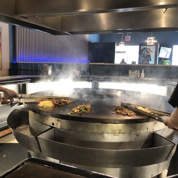 Mongolian Grill - The cooks in action. - Mongolian Near Me - Whitby, Ontario Mongolian Grill - The cooks in action. - Mongolian Near Me - Whitby, Ontario