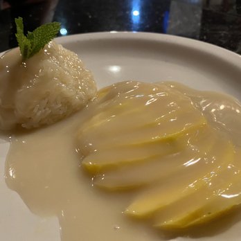 Tomy Thai - Mango sticky rice - who drenches it in coconut cream/ syrup like that?????? Ruined the entire dessert - Thai Near Me - Johnson City, Tennessee