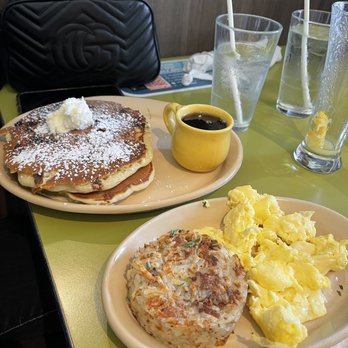 Snooze, an A.M. Eatery - Chocolate chip pancakes + scrambled eggs + hash browns - Breakfast & Brunch Near Me - Houston, Texas