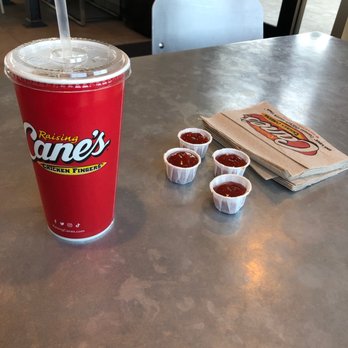Raising Cane's Chicken Fingers - THEE BEST SWEET TEA --- waiting on our food in the Dining area - Fast Food Near Me - Tulare, California Raising Cane's Chicken Fingers - THEE BEST SWEET TEA --- waiting on our food in the Dining area - Fast Food Near Me - Tulare, California