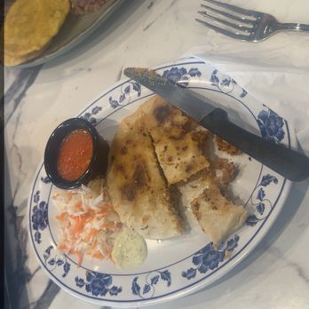 El Atlacatl - Pork Pupusa, melt in your mouth deliciousness. - Latin American Near Me - Miami, Florida El Atlacatl - Pork Pupusa, melt in your mouth deliciousness. - Latin American Near Me - Miami, Florida