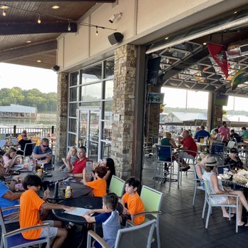 The Island - a large group of people sitting at tables - New American Near Me - Pottsboro, Texas The Island - a large group of people sitting at tables - New American Near Me - Pottsboro, Texas