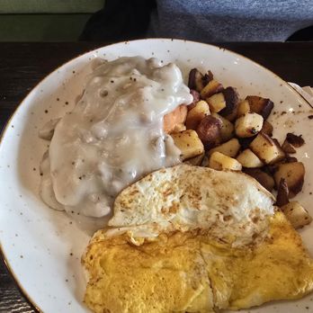 First Watch - Turkey sausage and gravy over biscuit with potatoes and two eggs - Breakfast & Brunch Near Me - Huntersville, North Carolina First Watch - Turkey sausage and gravy over biscuit with potatoes and two eggs - Breakfast & Brunch Near Me - Huntersville, North Carolina