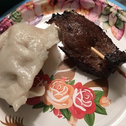 Steamed dumpling and teriyaki beef stick.