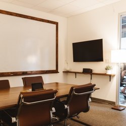 FLDWRK - Private meeting room available to rent out by the hour. Includes video conference call, display and large whiteboard.