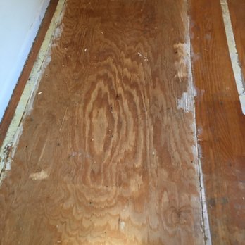 KPM Restoration - Bedroom where oak floor was cut out, replaced with plywood - Damage Restoration Near Me - Kingston, New York