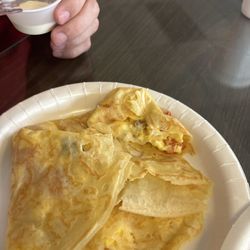 Creperie & European Cafe - The Annie's special. I had my spouse cut into it a little.