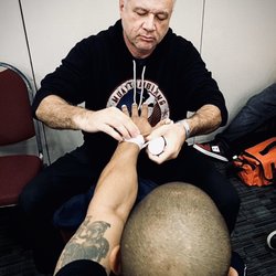 George Prevalsky's Boxing & Muay Thai Boxing Club - George wrapping hands before the fight.