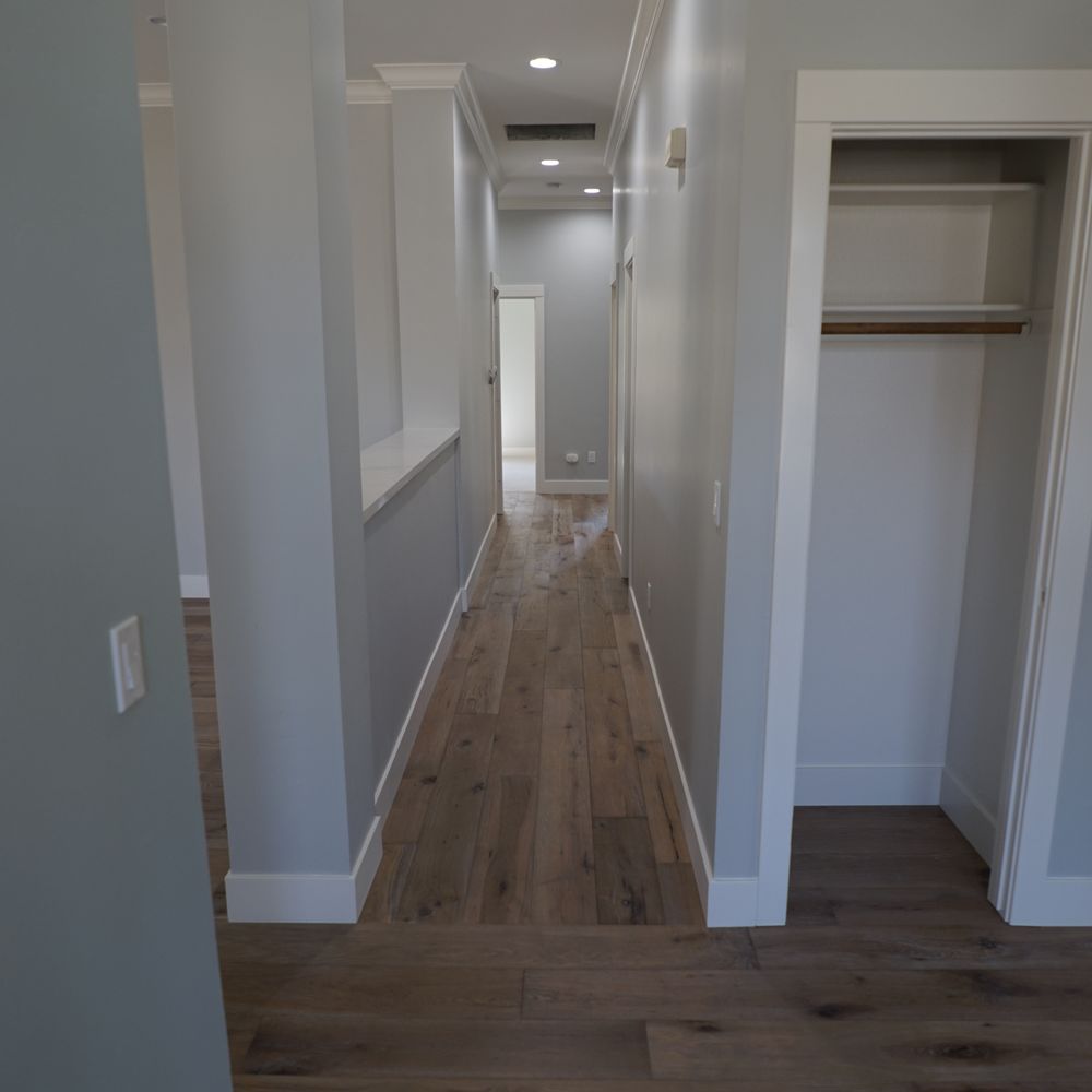 Pyramid Flooring Systems - a narrow hallway with white walls - Flooring Near Me - Davis, California Pyramid Flooring Systems - a narrow hallway with white walls - Flooring Near Me - Davis, California