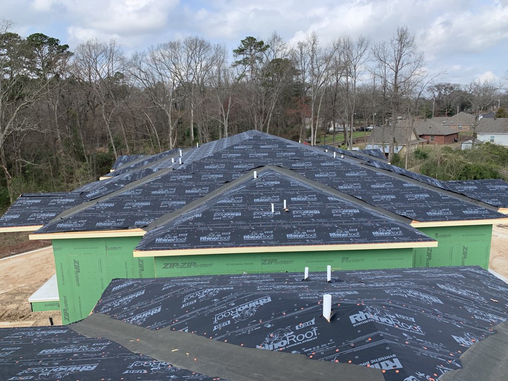 Slide of Master Built Roofing