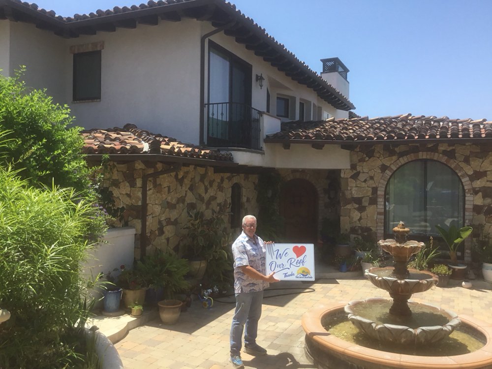 Slide of The Roof Masters