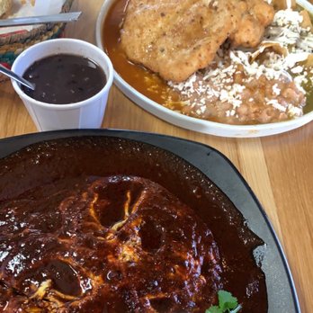 Potzolcano - Huevos con mole and chilaquiles with both sauces red & green con milanesa de pollo - Mexican Near Me - Santa Ana, California Potzolcano - Huevos con mole and chilaquiles with both sauces red & green con milanesa de pollo - Mexican Near Me - Santa Ana, California