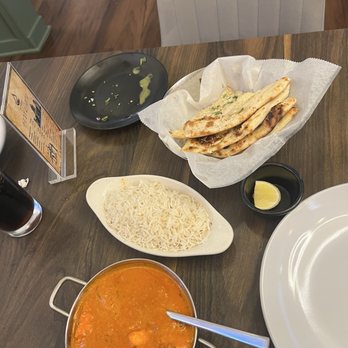Mumbai Fine - Chicken Tikki Masala with rice (included) Garlic Naan - Indian Near Me - Cedar Hill, Texas Mumbai Fine - Chicken Tikki Masala with rice (included) Garlic Naan - Indian Near Me - Cedar Hill, Texas