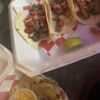 Chile & Chili's - 2 steak tacos add tomatoes 1 pork taco add tomatoes and a papusa. - Tacos Near Me - Tallahassee, Florida