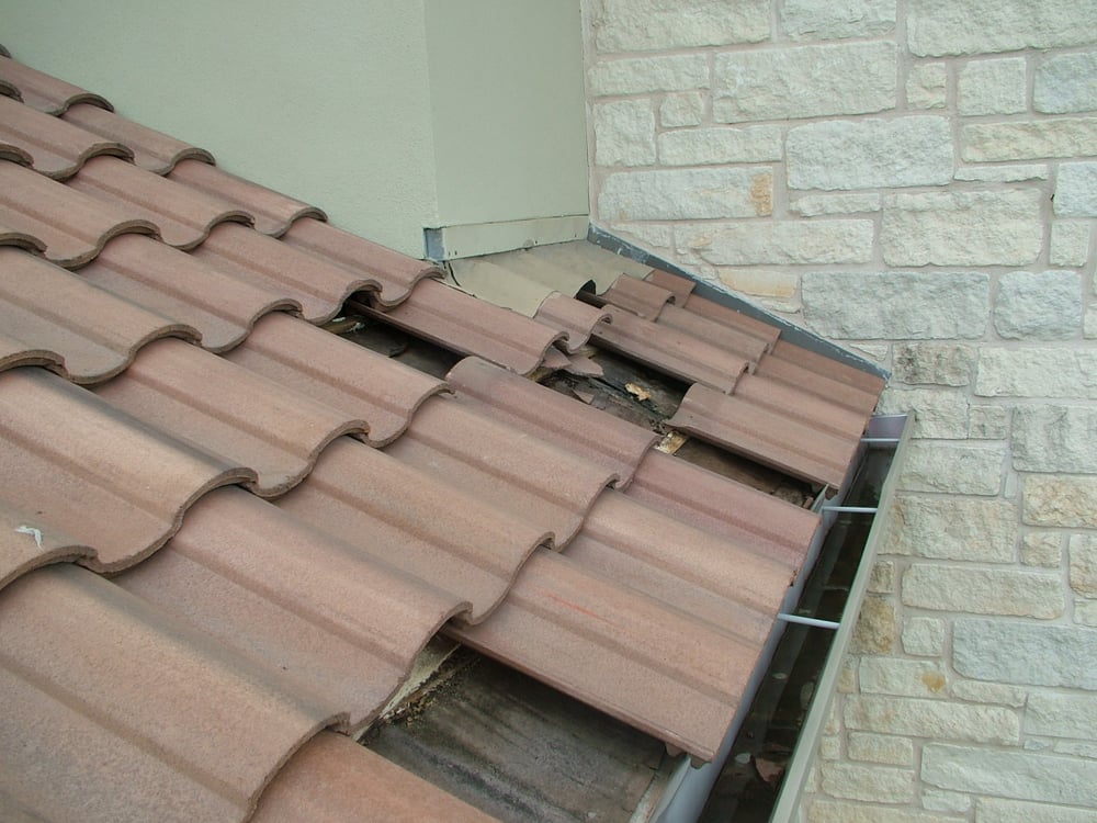 Slide of Twin Brothers Roofing