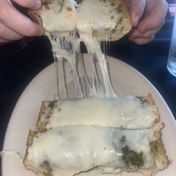 Pinocchio's Incredible Italian - Green pesto cheese bread - Pizza Near Me - Greeley, Colorado Pinocchio's Incredible Italian - Green pesto cheese bread - Pizza Near Me - Greeley, Colorado