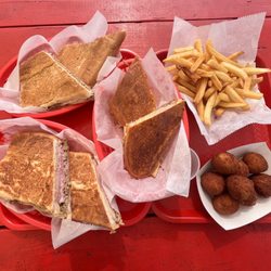 La Cocinita Cubana - Cuban Sandwich, Papa Fritas Mini Papas Rellenas, Pan con Lechon Sandwich, and Media Noche Sandwich. Delicioso!
