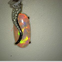 Prospector's Pouch - Opal and diamond pendant set in gold