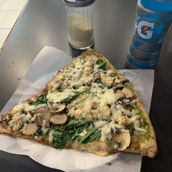 Eight Street Pizza - a slice of pizza with mushrooms and spinach - Pizza Near Me - Sacramento, California Eight Street Pizza - a slice of pizza with mushrooms and spinach - Pizza Near Me - Sacramento, California