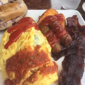 Longboards - Ono breakfast spread. Mushroom, spinach with cheese omelette all the Ono meats and a bagel. This was serving two serving went quick. - Bars Near Me - Kapolei, Hawaii