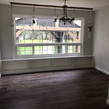 Best Buy Floors - a room with a window and a wooden floor - Flooring Near Me - Bellevue, Washington