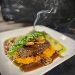 Snake River Saloon and Steakhouse - An amazing nightly special featuring rosemary braised beef short rib, sweet potato mash, creamed Swiss chard & an exotic mushroom demi-glace