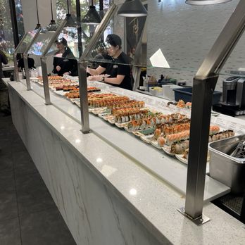 FOB Sushi Bar - We didn't catch her name, but the employee that helped us out is the one on the left by the register! Many thanks to her! - Sushi Bars Near Me - Seattle, Washington