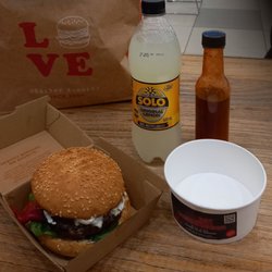 Grill'd - The whole dinner meal.  Demogorgon Burger. With a side of monster sauce. And a solo drink as well.
