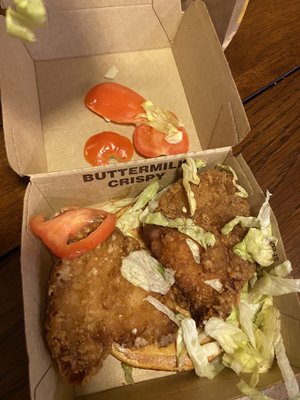 Photo of McDonald's - Riverside, CA, US. Didn't think i would notice you guys put two small chickens into my sandwich and threw a bunch a crap in it ..